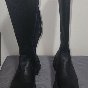 Tall riding boots.